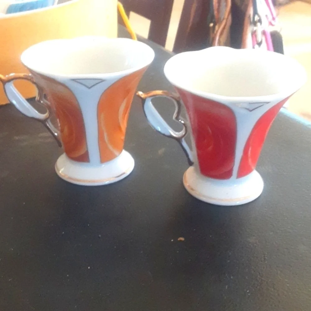 Set of Red and Orange Decorative Cups